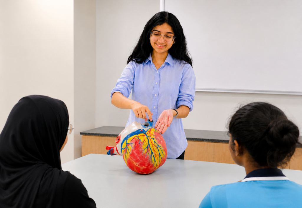 Learner leading a Medics Society workshop during Co-Curricular Activities at Nexus International School Malaysia.