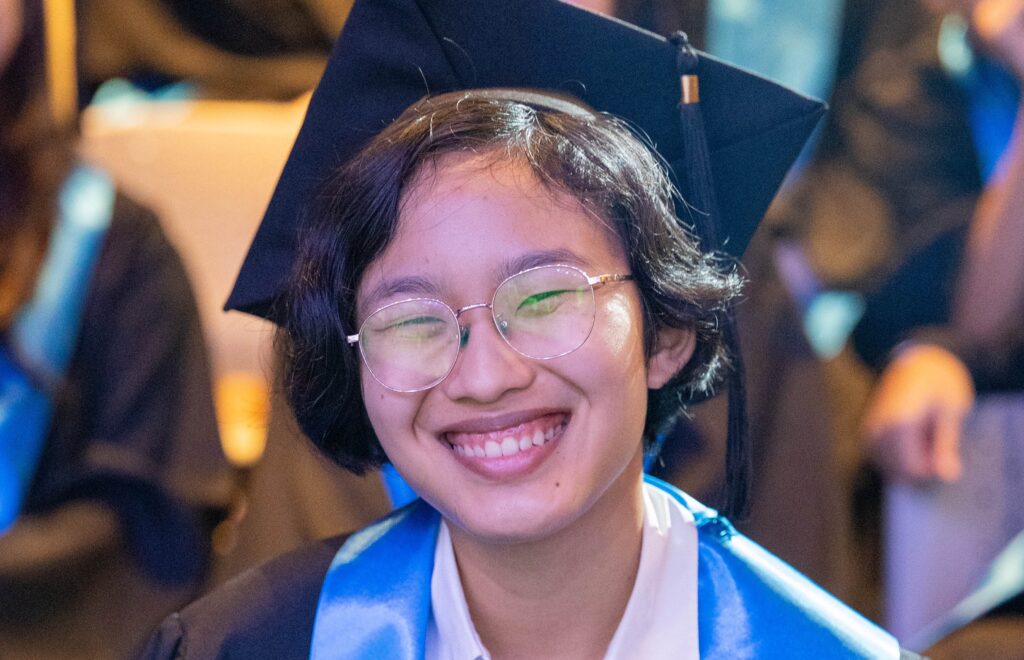 Amni, an IB Diploma Programme learner, celebrating her University Offer during the Class of 2026 IB Graduation ceremony at Nexus International School Malaysia.